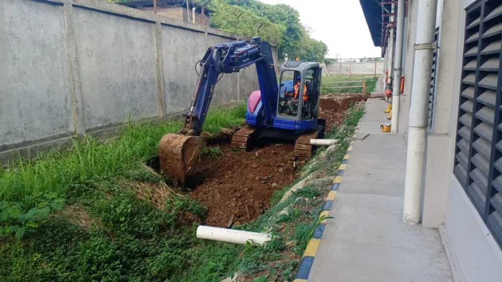 Sinar Alam Cakrabuana Using Big Machinery to Build Rain Water Absorption
